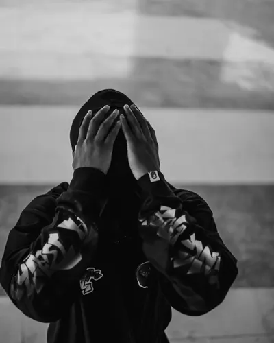 Wallflower crewneck — hands over face